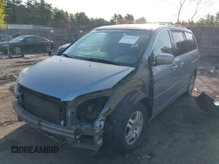 2006 Honda Odyssey EX-L with VIN 5FNRL38706B031177, listed as a IAAI auction lot 42123001 with 146,149 mi miles. Bid and sale history available at carsss.com. Image 2.