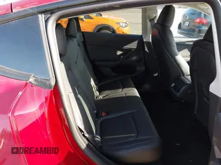 2024 Tesla Model Y Long Range with VIN 7SAYGDEE9RF199805, listed as a IAAI auction lot 42018221 with 7,359 mi miles. Bid and sale history available at carsss.com. Image 8.