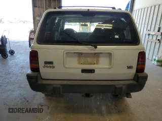 1995 Jeep Grand Cherokee Laredo with VIN 1J4GZ58Y0SC572757, listed as a Copart auction lot 52733375 with 160,588 mi miles and Salvage Title. Bid and sale history available at carsss.com. Image 6.