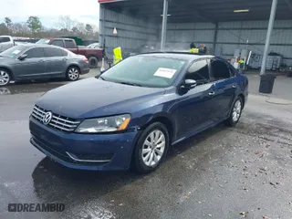 2014 Volkswagen Passat Wolfsburg Ed with VIN 1VWAT7A3XEC085932, listed as a IAAI auction lot 41567573 with 165,154 mi miles. Bid and sale history available at carsss.com. Image 2.