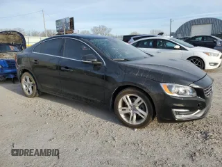 2015 Volvo S60 T5 Drive-E Platinum z VIN YV140MFDXF1302217, wystawiony jako Copart lot #50373865 z przebiegiem Nie podano mil oraz Szkoda całkowita • Salvage title. Historia ofert i sprzedaży dostępna na DreamBid. Obrazek 4.