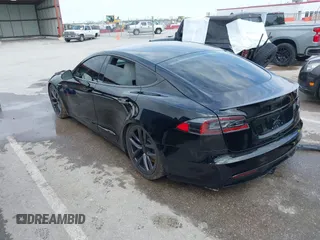 2022 Tesla Model S Plaid with VIN 5YJSA1E60NF460244, listed as a IAAI auction lot 41996403 with Not provided miles and . Bid and sale history available at DreamBid. Image 3.