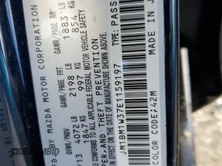 2014 Mazda 3 S Grand Touring with VIN JM1BM1W37E1159197, listed as a Copart auction lot 47953025 with 58,776 mi miles and Salvage Title. Bid and sale history available at DreamBid. Image 12.