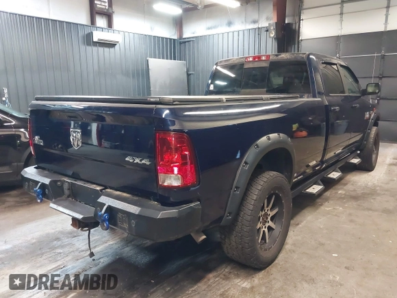 2013 Ram 2500 SLT z VIN 3C6TR5JT1DG566895, wystawiony jako IAAI lot #42096955 z przebiegiem 168 454 mil mil oraz . Historia ofert i sprzedaży dostępna na DreamBid. Obrazek 4.