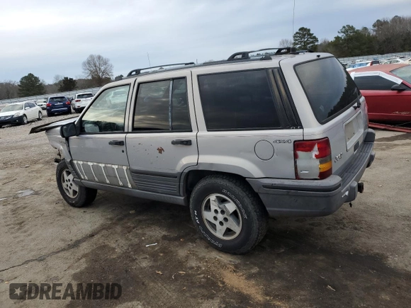 1995 Jeep Grand Cherokee Laredo with VIN 1J4GZ58S7SC517783, listed as a Copart auction lot 43057145 with 225,273 mi miles and Salvage Title. Bid and sale history available at carsss.com. Image 2.