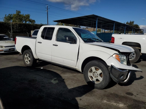 2005 Nissan Frontier 2WD Nismo with VIN 1N6AD07U15C409354, listed as a Copart auction lot 80585074 with 257,545 mi miles and Salvage Title. Bid and sale history available at carsss.com. Image 4.