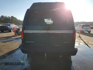 1998 GMC Safari z VIN 1GDDM19W5WB503552, wystawiony jako Copart lot #88247495 z przebiegiem 267 494 mil mil oraz Szkoda całkowita • Salvage title. Historia ofert i sprzedaży dostępna na DreamBid. Obrazek 6.