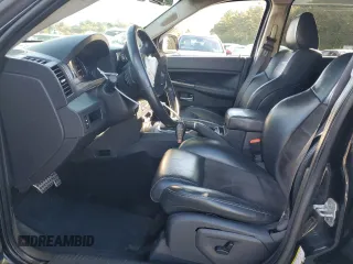 2008 Jeep Grand Cherokee SRT-8 with VIN 1J8HR78368C152318, listed as a Copart auction lot 74203604 with 157,840 mi miles and Salvage Title. Bid and sale history available at carsss.com. Image 7.