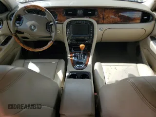 2004 Jaguar XJ with VIN SAJWA71C24SG28164, listed as a Copart auction lot 73968134 with 0 mi miles and Salvage Title. Bid and sale history available at carsss.com. Image 8.