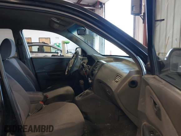 2006 Hyundai Tucson GL with VIN KM8JM12B96U252484, listed as a IAAI auction lot 42100855 with 273,655 mi miles. Bid and sale history available at carsss.com. Image 5.