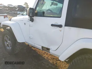 2018 Jeep Wrangler Sahara with VIN 1C4AJWBG2JL821132, listed as a IAAI auction lot 42523688 with 86,244 mi miles and . Bid and sale history available at DreamBid. Image 18.