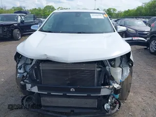 2019 Chevrolet Equinox Premier with VIN 3GNAXYEX7KS502799, listed as a IAAI auction lot 42102610 with 73,575 mi miles and . Bid and sale history available at DreamBid. Image 13.