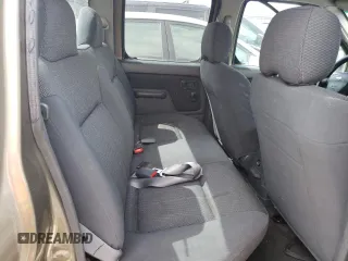 2002 Nissan Frontier XE z VIN 1N6ED29X92C367175, wystawiony jako Copart lot #54979685 z przebiegiem 281 470 mil mil oraz Szkoda całkowita • Salvage title. Historia ofert i sprzedaży dostępna na DreamBid. Obrazek 11.