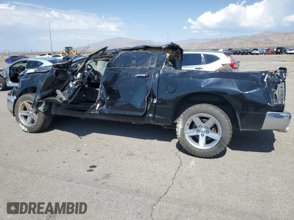2012 Ram 1500 Big Horn with VIN 1C6RD7LT5CS241000, listed as a Copart auction lot 70617974 with 148,732 mi miles and Salvage Title. Bid and sale history available at carsss.com. Image 2.