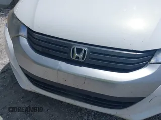 2010 Honda Insight EX with VIN JHMZE2H70AS008996, listed as a IAAI auction lot 42181399 with 359,468 mi miles and . Bid and sale history available at DreamBid. Image 13.