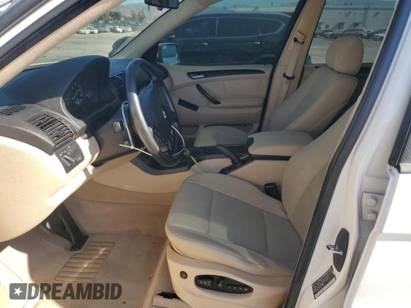 2006 BMW X5 3.0i with VIN 5UXFA135X6LY28695, listed as a Copart auction lot 77018914 with 209,013 mi miles and Salvage Title. Bid and sale history available at carsss.com. Image 7.