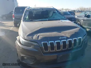 2019 Jeep Cherokee Altitude with VIN 1C4PJMLBXKD194449, listed as a IAAI auction lot 41471507 with 61,107 mi miles. Bid and sale history available at carsss.com. Image 6.