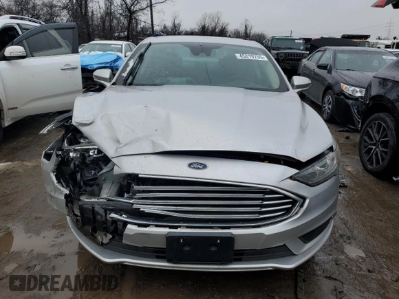 2018 Ford Fusion SE z VIN 3FA6P0H79JR270777, wystawiony jako Copart lot #45319755 z przebiegiem 69 152 mil mil oraz Szkoda całkowita • Salvage title. Historia ofert i sprzedaży dostępna na DreamBid. Obrazek 5.