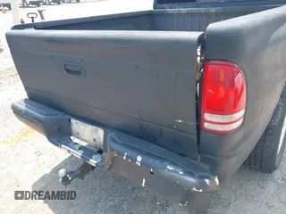 2004 Dodge Dakota SLT z VIN 1D7HG48N34S693877, wystawiony jako IAAI lot #42423197 z przebiegiem 163 141 mil mil oraz . Historia ofert i sprzedaży dostępna na DreamBid. Obrazek 6.