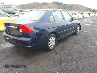 2003 Honda Civic LX with VIN 2HGES165X3H564619, listed as a IAAI auction lot 42017947 with 125,518 mi miles. Bid and sale history available at carsss.com. Image 4.