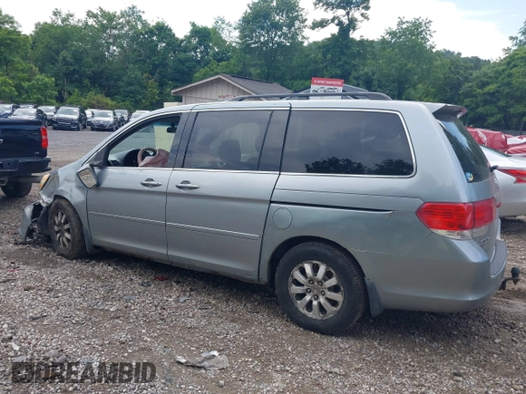 2010 Honda Odyssey EX with VIN 5FNRL3H4XAB015955, listed as a IAAI auction lot 42590535 with Not provided miles and . Bid and sale history available at DreamBid. Image 13.