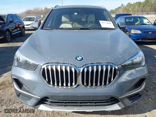 2021 BMW X1 xDrive28i with VIN WBXJG9C07M5T23053, listed as a IAAI auction lot 41774663 with 66,770 mi miles. Bid and sale history available at carsss.com. Image 12.