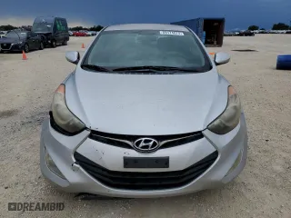2013 Hyundai Elantra Coupe GS PZEV with VIN KMHDH6AE5DU003333, listed as a Copart auction lot 69174074 with 128,797 mi miles and Salvage Title. Bid and sale history available at carsss.com. Image 5.