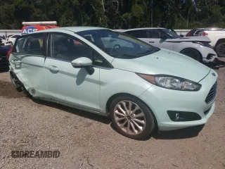 2017 Ford Fiesta Titanium with VIN 3FADP4FJ1HM143817, listed as a Copart auction lot 72231594 with 88,453 mi miles and Salvage Title. Bid and sale history available at DreamBid. Image 4.