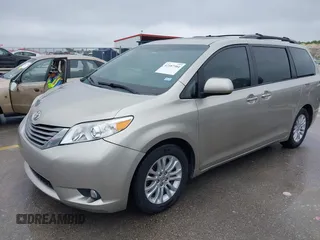 2015 Toyota Sienna XLE with VIN 5TDYK3DCXFS578888, listed as a IAAI auction lot 42187384 with 105,287 mi miles and . Bid and sale history available at DreamBid. Image 17.