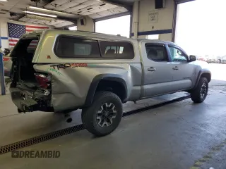 2023 Toyota Tacoma SR5 z VIN 3TMDZ5BNXPM165719, wystawiony jako Copart lot #58256035 z przebiegiem 13 681 mil mil oraz Szkoda całkowita • Salvage title. Historia ofert i sprzedaży dostępna na DreamBid. Obrazek 3.