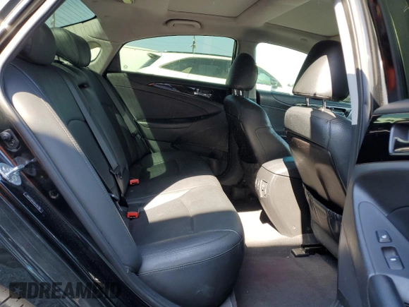 2013 Hyundai Sonata SE z VIN 5NPEC4AC4DH726725, wystawiony jako Copart lot #51821295 z przebiegiem 94 092 mil mil oraz Szkoda całkowita • Salvage title. Historia ofert i sprzedaży dostępna na DreamBid. Obrazek 10.