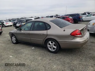 2004 Ford Taurus SE with VIN 1FAFP53U34G129631, listed as a Copart auction lot 45054375 with 182,089 mi miles and Salvage title. Bid and sale history available at DreamBid. Image 2.