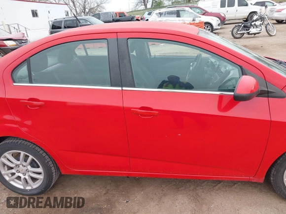 2012 Chevrolet Sonic LT with VIN 1G1JC5SH7C4133484, listed as a IAAI auction lot 42076809 with 100,506 mi miles and . Bid and sale history available at DreamBid. Image 13.