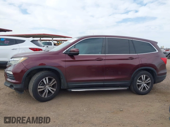 2016 Honda Pilot EX-L with VIN 5FNYF5H57GB028307, listed as a IAAI auction lot 41925711 with 125,118 mi miles and . Bid and sale history available at DreamBid. Image 14.