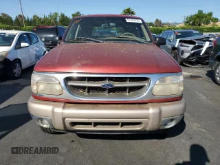 2001 Ford Explorer z VIN 1FMDU64P21UB11722, wystawiony jako Copart lot #57425525 z przebiegiem 116 938 mil mil oraz Szkoda całkowita • Salvage title. Historia ofert i sprzedaży dostępna na DreamBid. Obrazek 5.