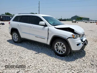 2021 Jeep Grand Cherokee Laredo E with VIN 1C4RJEAG7MC596709, listed as a Copart auction lot 57466875 with 56,164 mi miles and Salvage title. Bid and sale history available at DreamBid. Image 4.
