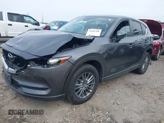 2017 Mazda CX-5 Touring z VIN JM3KFBCL4H0178747, wystawiony jako IAAI lot #42041380 z przebiegiem 112 083 mil mil oraz . Historia ofert i sprzedaży dostępna na DreamBid. Obrazek 2.