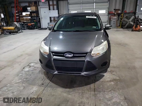 2013 Ford Focus SE z VIN 1FADP3F23DL267439, wystawiony jako Copart lot #53536545 z przebiegiem 166 454 mil mil oraz Szkoda całkowita • Salvage title. Historia ofert i sprzedaży dostępna na DreamBid. Obrazek 13.
