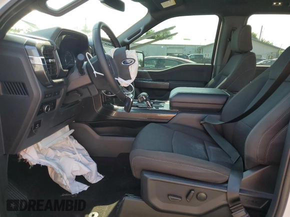 2023 Ford F-150 XL with VIN 1FTFW1E81PFA70563, listed as a Copart auction lot 60440685 with 31,198 mi miles and Salvage title. Bid and sale history available at DreamBid. Image 7.