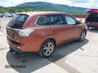 2014 Mitsubishi Outlander GT with VIN JA4JZ4AX6EZ006606, listed as a IAAI auction lot 42640681 with 161,904 mi miles and . Bid and sale history available at DreamBid. Image 4.