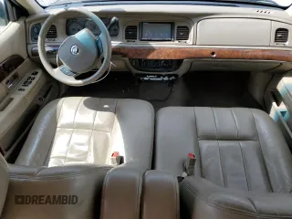 2005 Mercury Grand Marquis GS z VIN 2MEFM74W05X673934, wystawiony jako Copart lot #52608785 z przebiegiem 170 558 mil mil oraz Szkody całkowita. Historia ofert i sprzedaży dostępna na DreamBid. Obrazek 8.