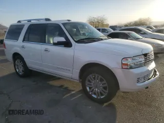 2010 Lincoln Navigator z VIN 5LMJJ2H58AEJ10577, wystawiony jako Copart lot #46904225 z przebiegiem 131 479 mil mil oraz Czysty tytuł • Clean title. Historia ofert i sprzedaży dostępna na DreamBid. Obrazek 4.