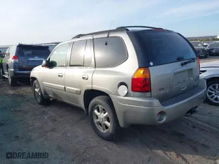 2002 GMC Envoy SLT with VIN 1GKDT13S622358940, listed as a IAAI auction lot 41444559 with 233,226 mi miles. Bid and sale history available at carsss.com. Image 3.