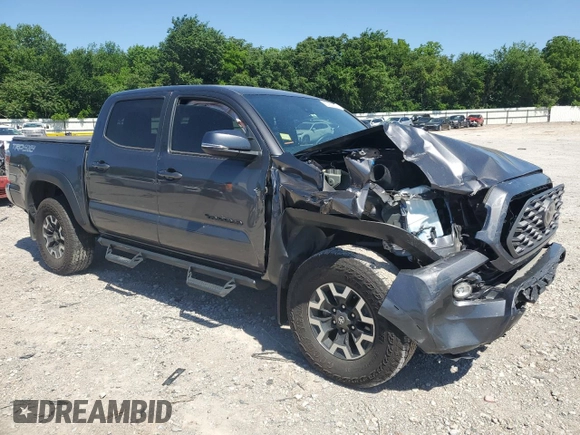 2023 Toyota Tacoma SR with VIN 3TYCZ5AN9PT131515, listed as a Copart auction lot 57900865 with Not provided miles and Salvage title. Bid and sale history available at DreamBid. Image 4.