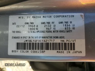 2012 Mazda 3 i Sport z VIN JM1BL1UFXC1621717, wystawiony jako Copart lot #54378805 z przebiegiem Nie podano mil oraz Szkoda całkowita • Salvage title. Historia ofert i sprzedaży dostępna na DreamBid. Obrazek 13.