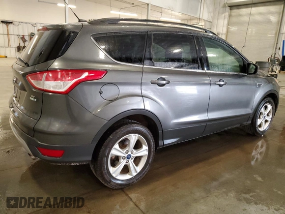 2016 Ford Escape SE с VIN 1FMCU9G99GUC61975, выставлен на аукционе Copart как лот 58042825 с пробегом 135 457 миль миль и Списание • Salvage title. История ставок и продаж доступна на DreamBid. Изображение 3.
