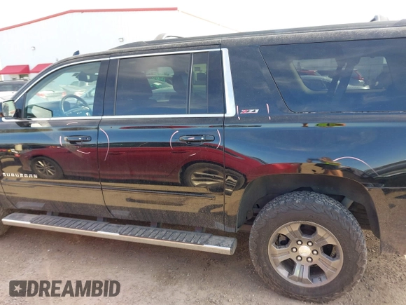 2016 Chevrolet Suburban LT with VIN 1GNSKHKC4GR275389, listed as a IAAI auction lot 41796216 with 144,776 mi miles and . Bid and sale history available at DreamBid. Image 15.