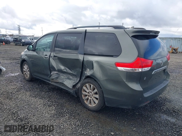 2011 Toyota Sienna XLE with VIN 5TDDK3DCXBS003666, listed as a IAAI auction lot 41807992 with 156,699 mi miles. Bid and sale history available at carsss.com. Image 3.