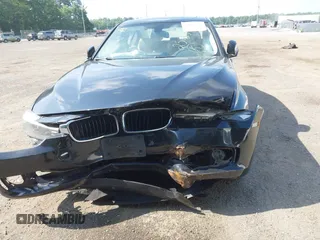 2014 BMW 3 Series 320i xDrive with VIN WBA3C3C56EK200175, listed as a IAAI auction lot 42617731 with 96,596 mi miles and . Bid and sale history available at DreamBid. Image 12.