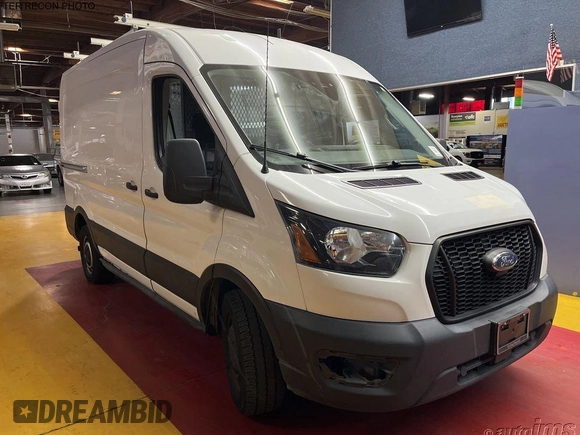 2021 Ford Transit Cargo with VIN 1FTYE1C87MKA94593, listed as a IAAI auction lot 42658954 with 99,425 mi miles and . Bid and sale history available at DreamBid. Image 9.